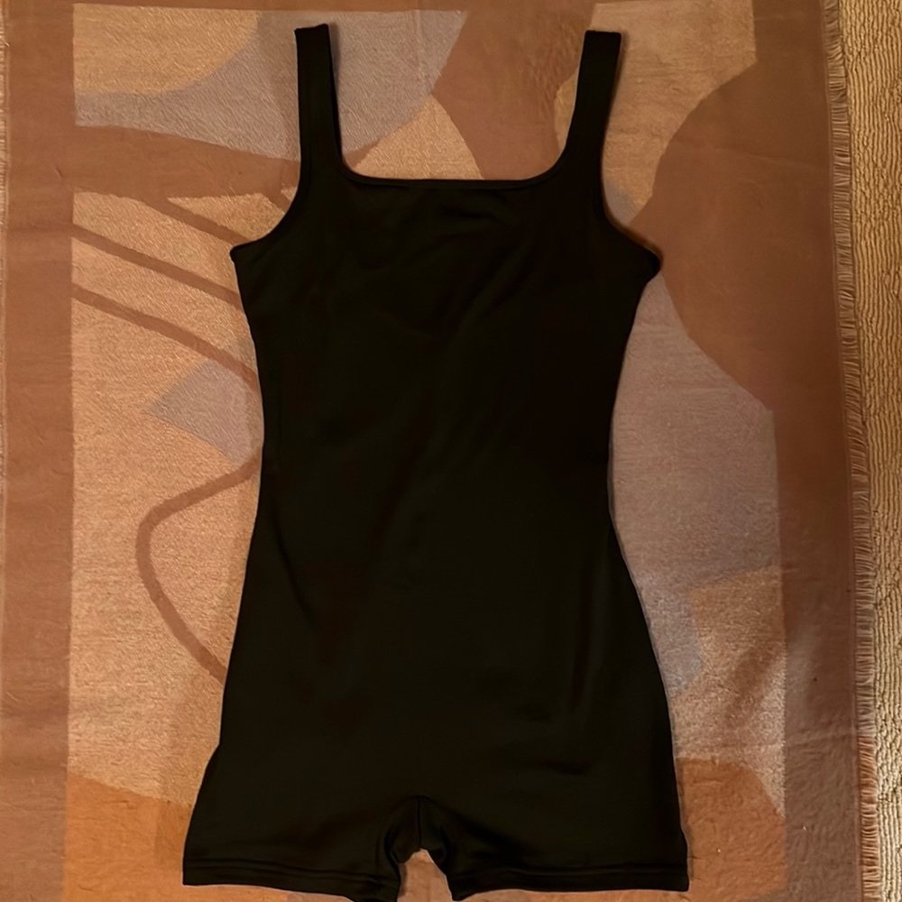 NWOT Woman’s Black Bodysuit inseam 4” S